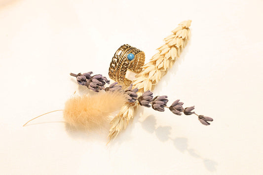 Adjustable wide ring combining boho and modern design