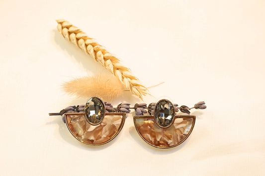 Gold-framed Luxe Crescent Earrings with dazzling gem detail, blending modern chic and timeless sophistication.