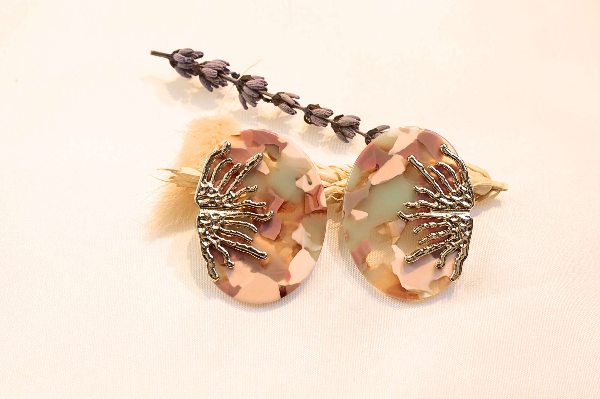Stunning Coral Earrings with nature-inspired metal details, crafted for those who love elegant and artistic jewelry.