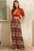 Lightweight and stylish 2-piece set with a flattering silhouette, ideal for vacations, special events, or everyday elegance.