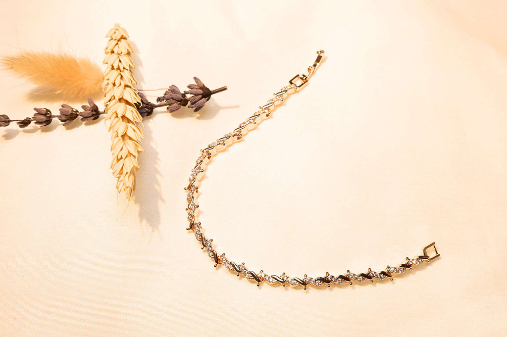 Luxury gold-plated bracelet featuring radiant Cubic Zirconia stones.
