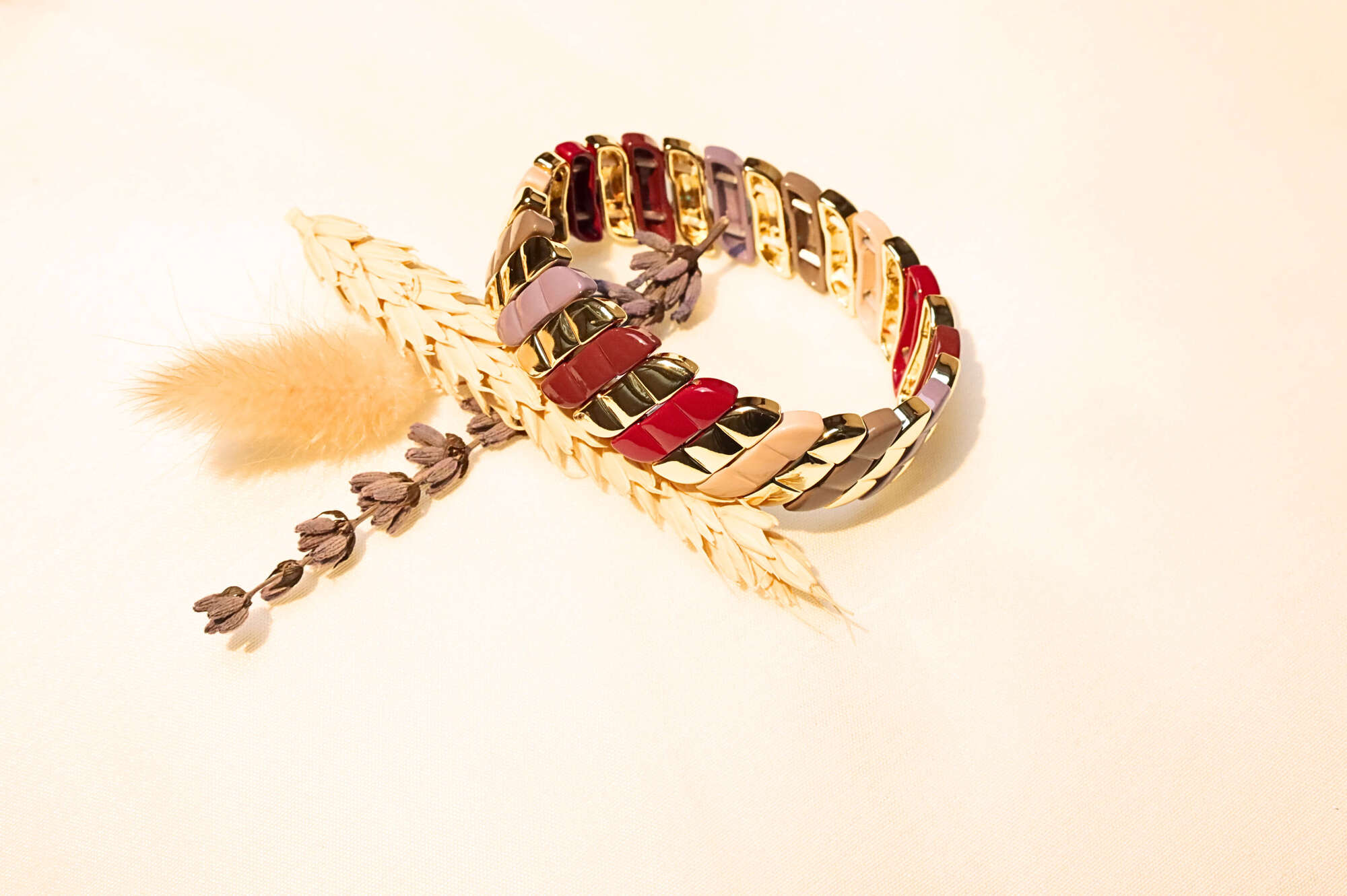 Gold Boho Mosaic Bracelet – A stunning mix of colorful enamel and polished gold links, blending elegance with bohemian charm.