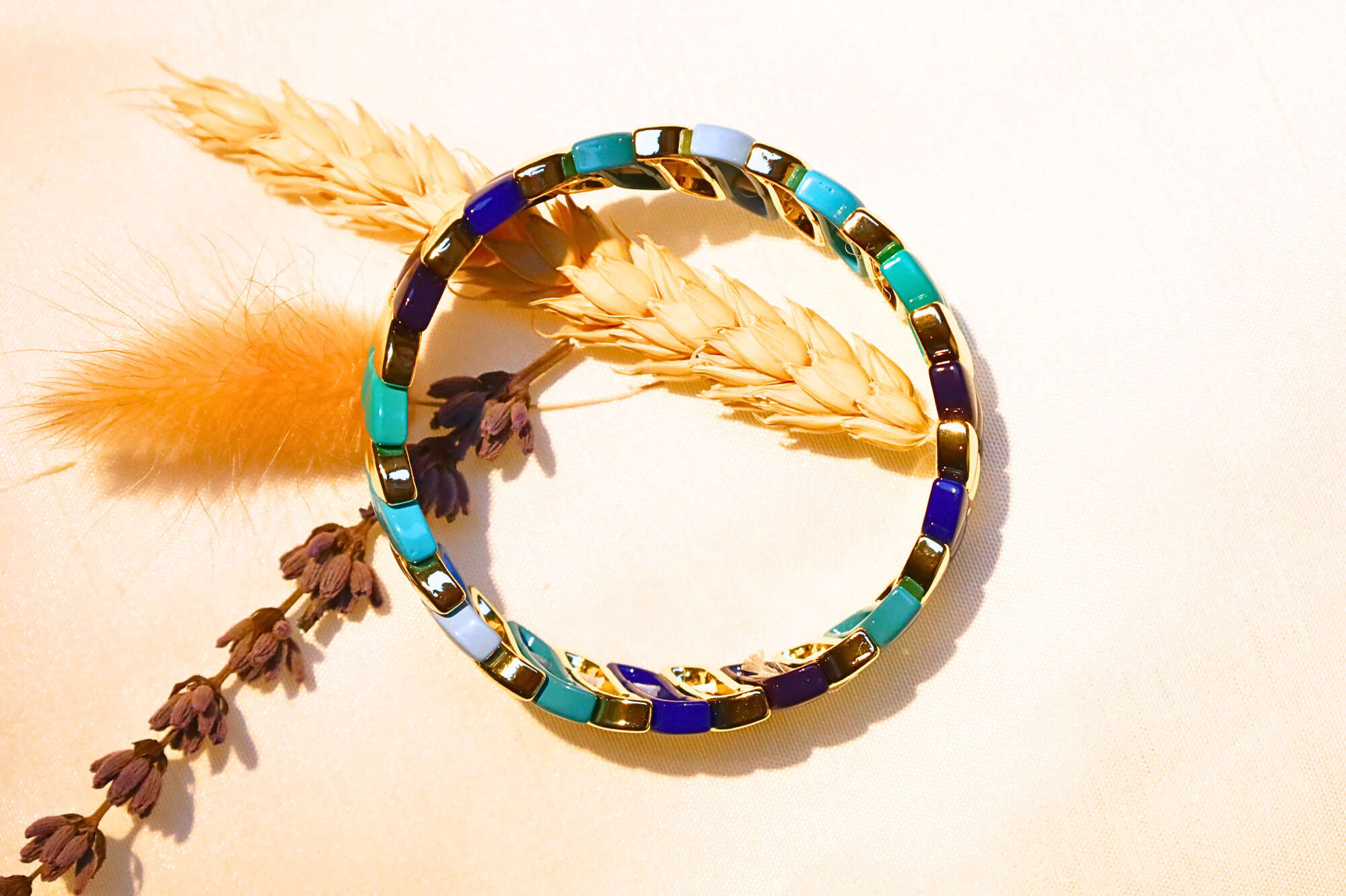 Gold Boho Mosaic Bracelet – A chic mix of turquoise, blue, and gold enamel links, adding a vibrant touch to any outfit.