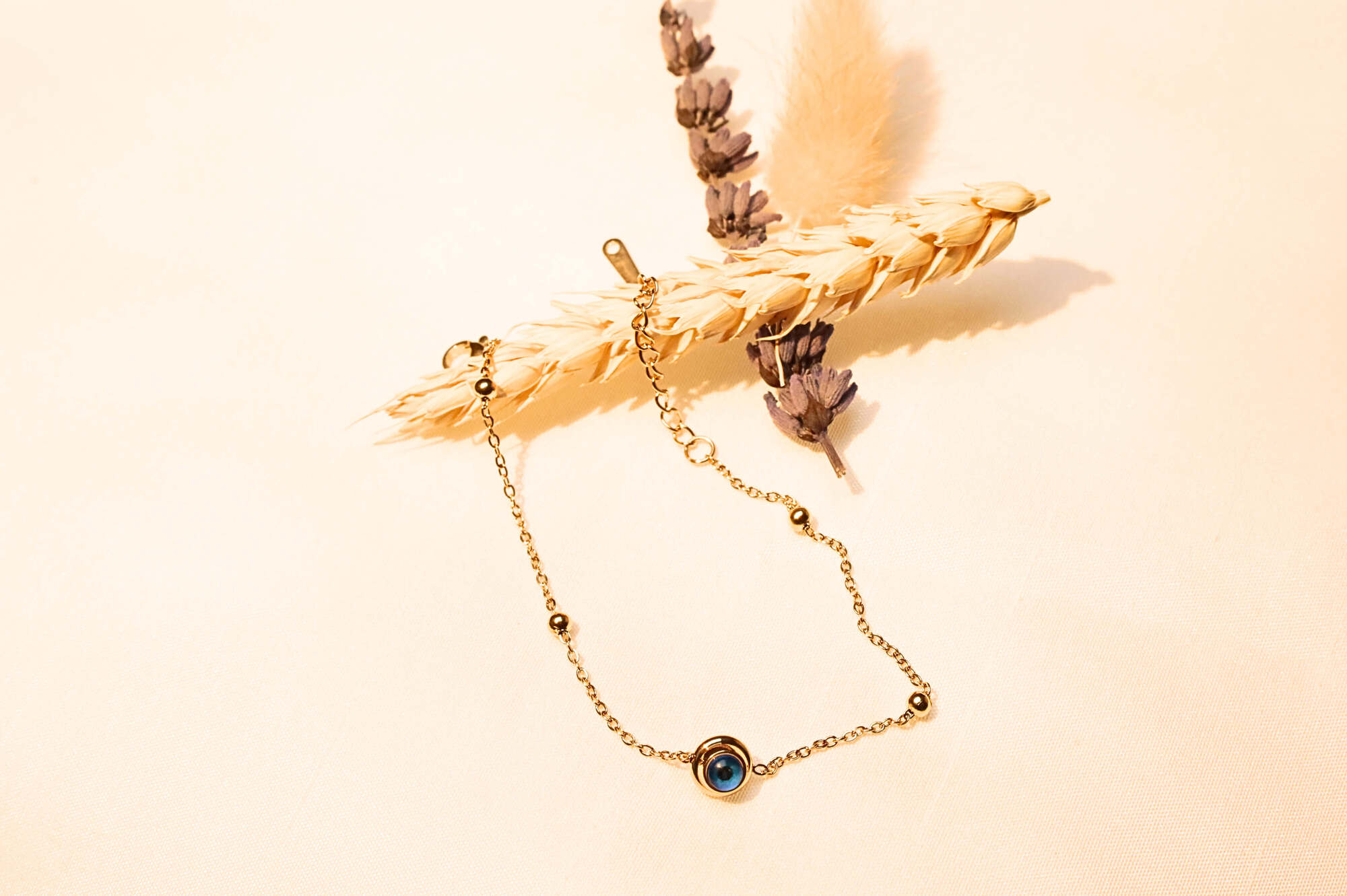 Gold-plated minimalist evil eye bracelet – stylish, elegant, and protective accessory.