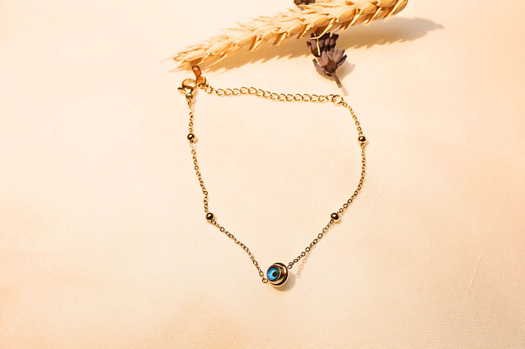 Minimalist gold-plated bracelet – a sleek and trendy way to ward off negative energy.
