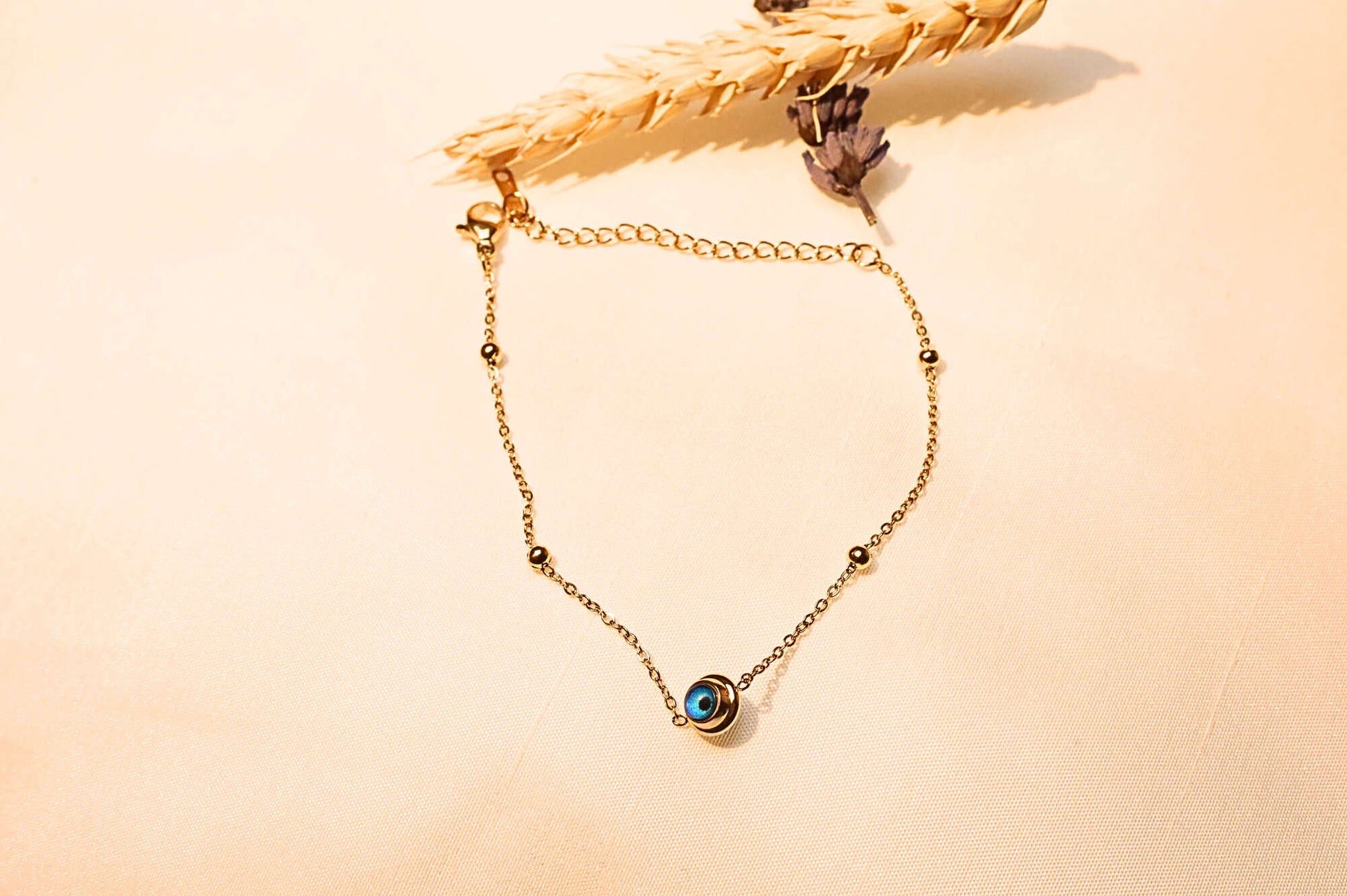 Minimalist gold-plated bracelet – a sleek and trendy way to ward off negative energy.

