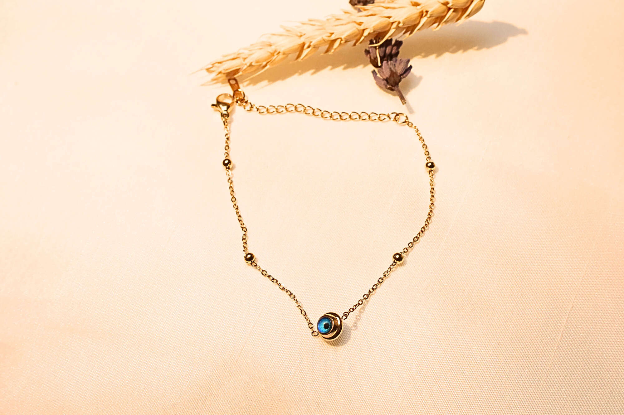 Minimalist gold-plated bracelet – a sleek and trendy way to ward off negative energy.
