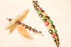 Gold-Plated Gemstone Statement Bracelet – A chic, eye-catching bracelet with gold plating and colorful gemstone accents.