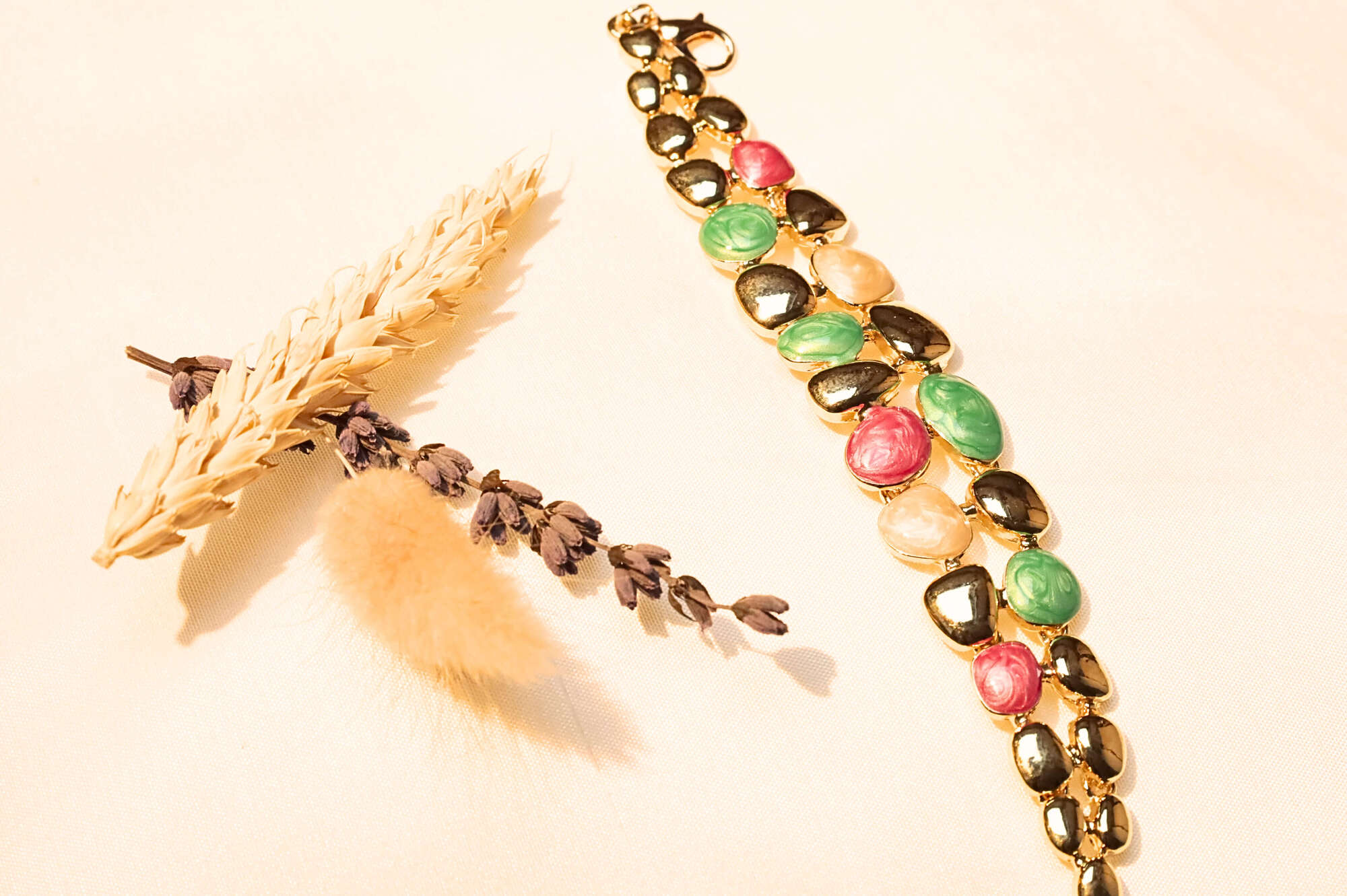 Gold-Plated Gemstone Statement Bracelet – A chic, eye-catching bracelet with gold plating and colorful gemstone accents.