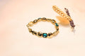 Gold-plated bracelet with blue gemstones – elegant and timeless design for everyday wear and special occasions.