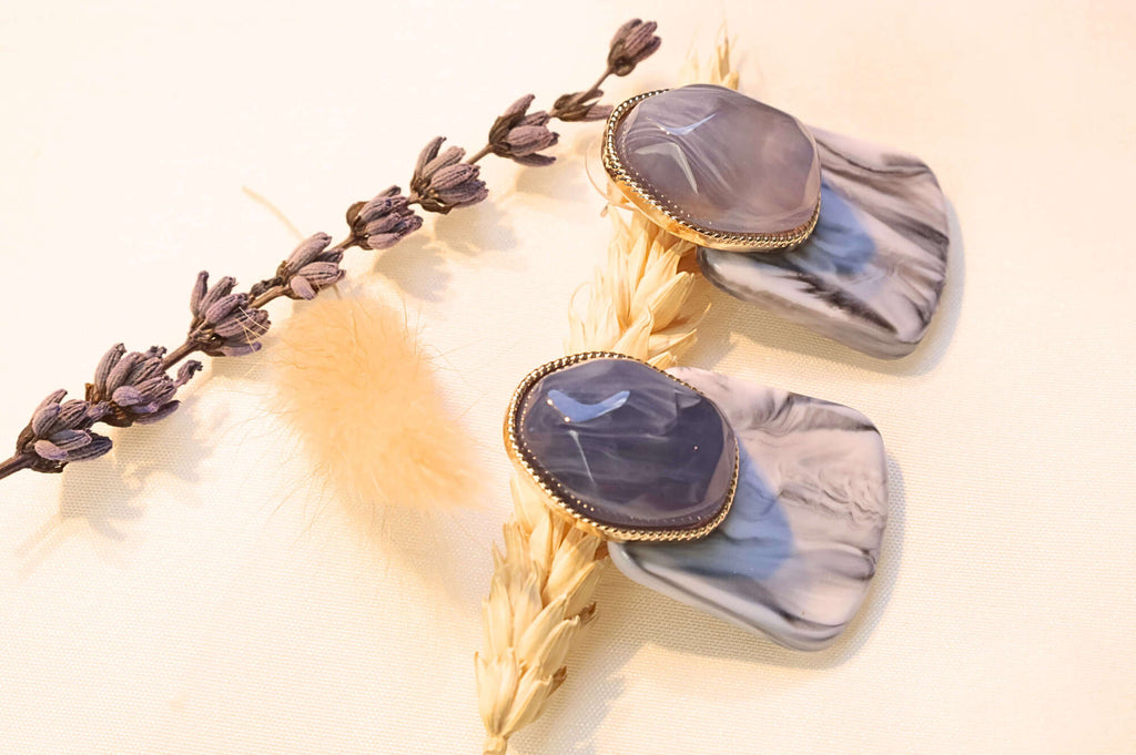 Elegant marble stone earrings with gold-plated setting in a purple and gray mix.