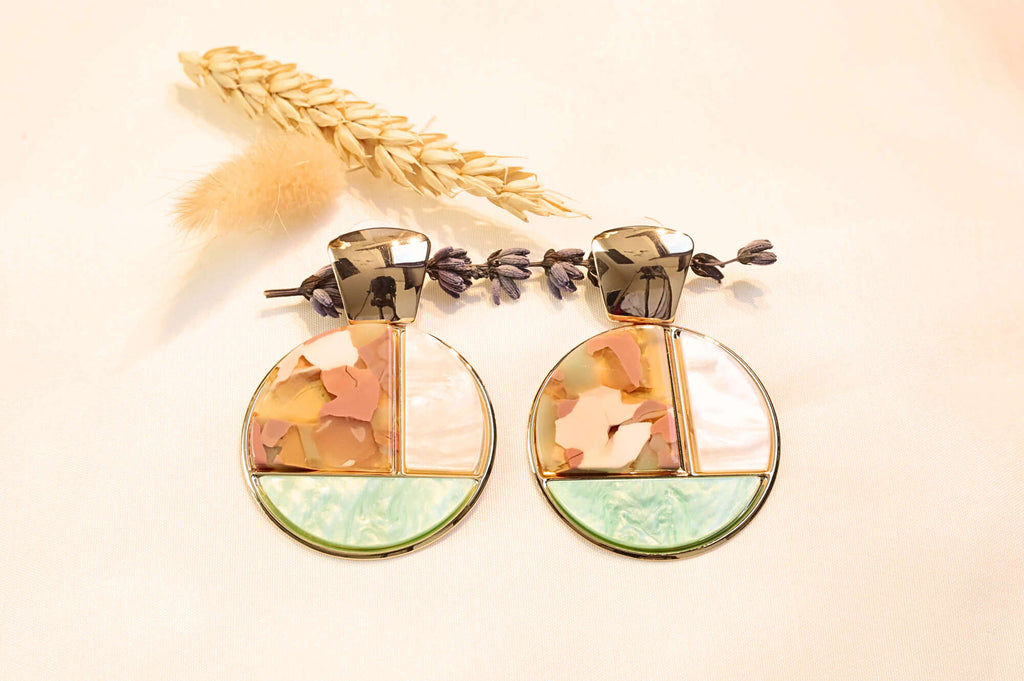 Statement earrings redefined! Luxe Mosaic Earrings add a touch of modern elegance to any look.