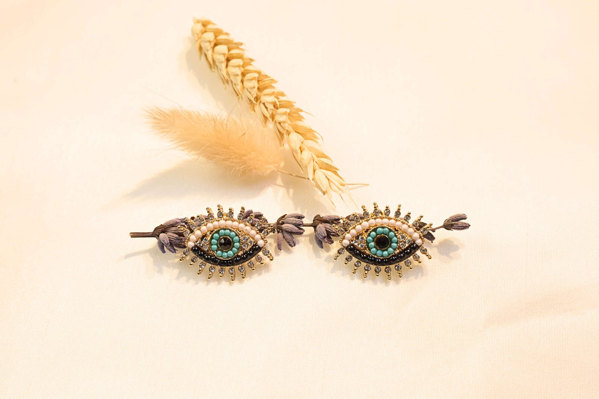 Mystic Eye Protection Earrings with intricate detailing, symbolizing elegance and spiritual protection in a chic design.