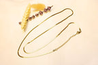 Snake chain necklace in gold and silver tones – A sleek and minimalist touch.