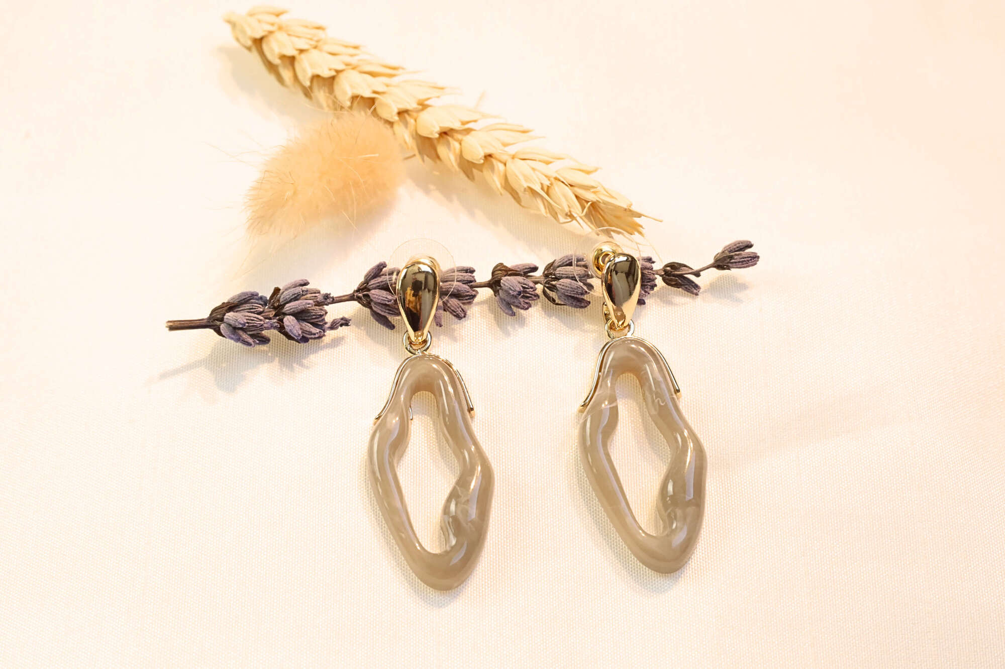 Crafted for the stylish minimalist, WaveFlow earrings are the perfect blend of simplicity and sophistication.